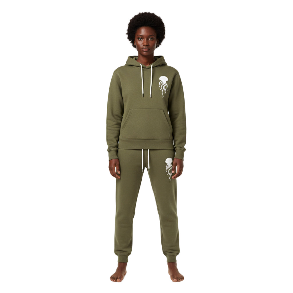 Person wearing a olive green hoodie and pants set with a jellyfish logo on a white background